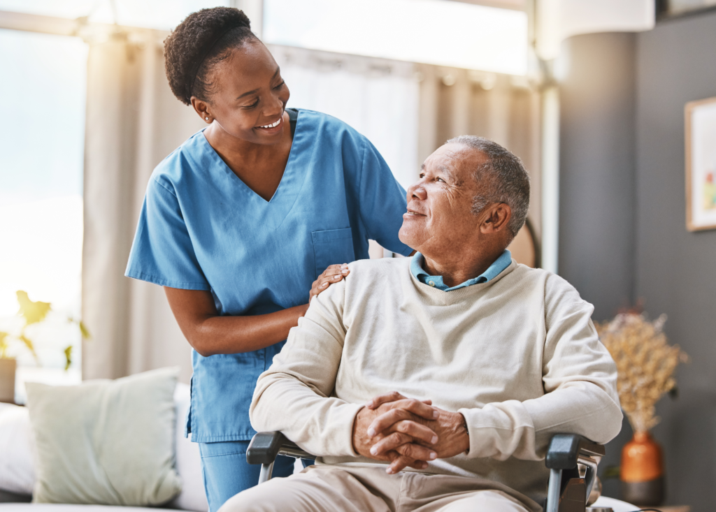 A senior residence staff member provides assistance to elderly resident
